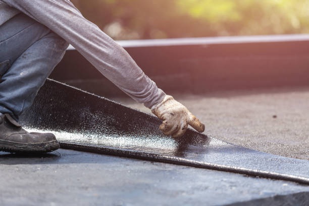 Professional Waterproofing technician working in West Chicago, IL